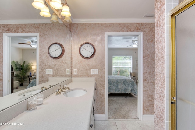 1465 Admiral Nimitz Ave, Daytona Beach, FL 32124 - ensuite bathroom with a ceiling fan, vanity, tile patterned flooring, baseboards, and ornamental molding
