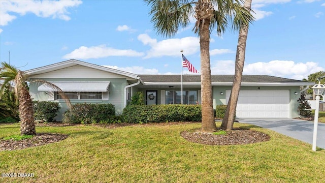 single story home featuring a garage and a front lawn