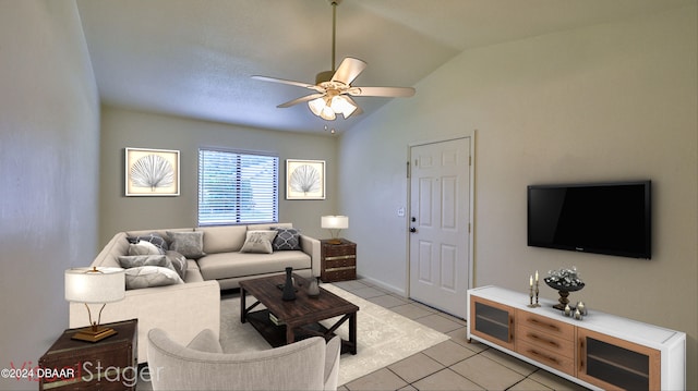 tiled living room with lofted ceiling and ceiling fan