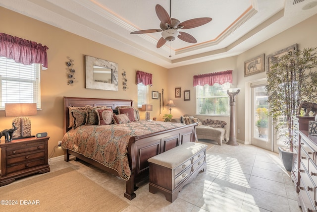 bedroom featuring multiple windows, ceiling fan, crown molding, and light tile patterned floors