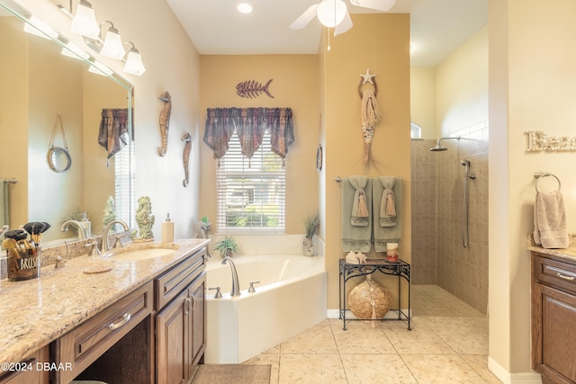 bathroom featuring tile patterned flooring, vanity, separate shower and tub, and ceiling fan