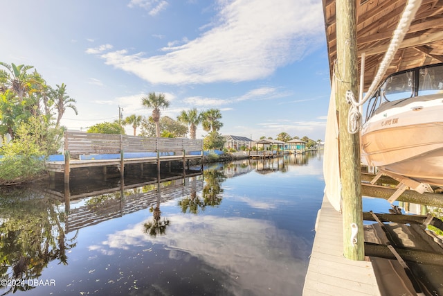 view of dock with a water view