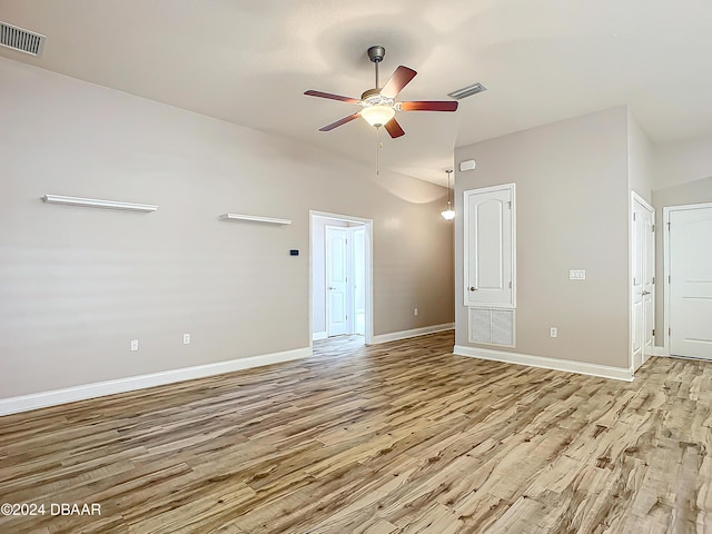 spare room featuring ceiling fan and light wood-type flooring