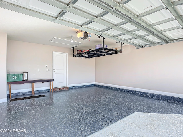 garage featuring a garage door opener