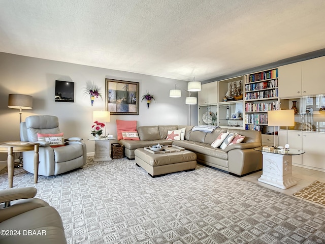 living room with a textured ceiling