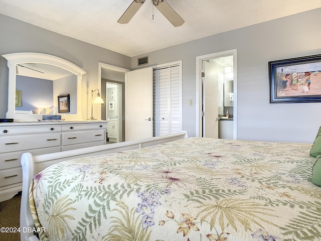 bedroom with ceiling fan and a closet