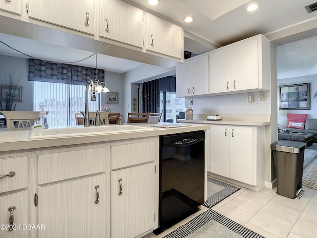 kitchen featuring white cabinetry, dishwasher, sink, pendant lighting, and light tile patterned floors