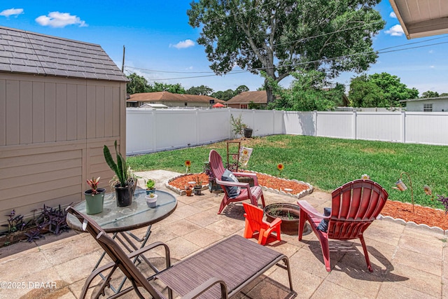 1724 Umbrella Tree Dr, Edgewater, FL 32132 - view of patio with a fire pit