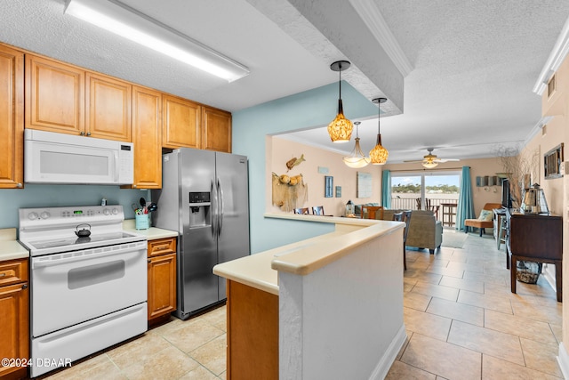 kitchen with ornamental molding, a textured ceiling, white appliances, ceiling fan, and light tile patterned floors