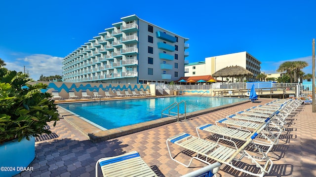 view of swimming pool featuring a patio