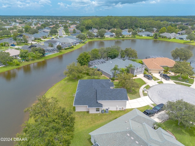 bird's eye view with a water view