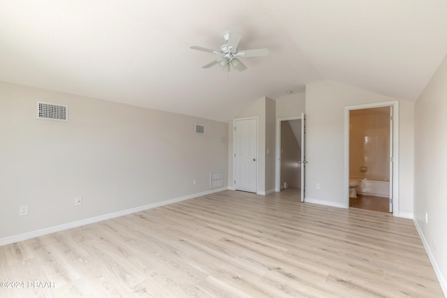 interior space with light hardwood / wood-style floors, ceiling fan, and vaulted ceiling