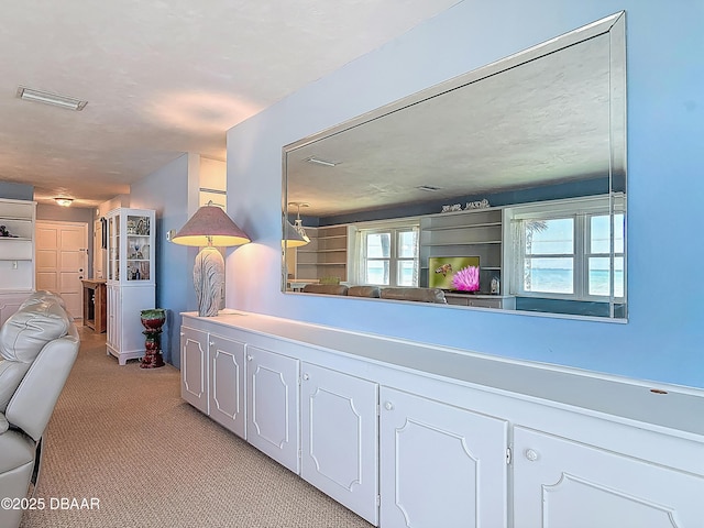 1926 Ocean Shore Blvd Unit 3120, Ormond Beach, FL 32176 - corridor featuring light colored carpet and visible vents