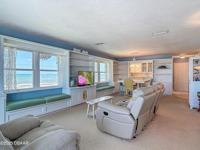1926 Ocean Shore Blvd Unit 3120, Ormond Beach, FL 32176 - carpeted living area featuring visible vents