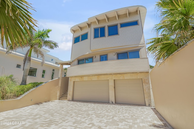 view of front of property featuring a garage