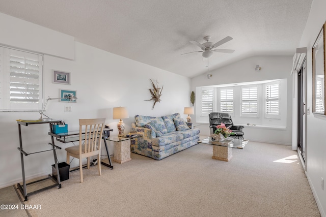 carpeted living room featuring ceiling fan, a textured ceiling, and vaulted ceiling