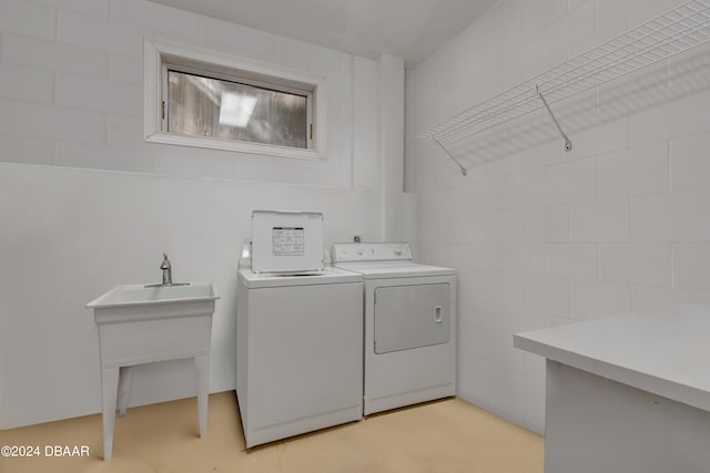 laundry area featuring separate washer and dryer