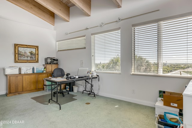 carpeted home office with lofted ceiling with beams