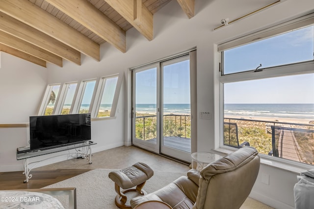 living room featuring lofted ceiling with beams