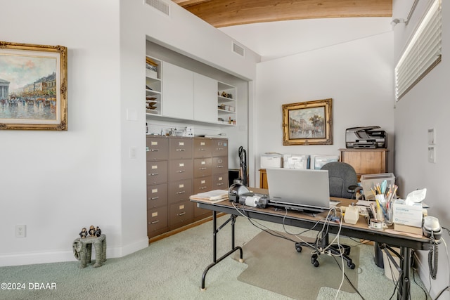 office space featuring vaulted ceiling and carpet flooring