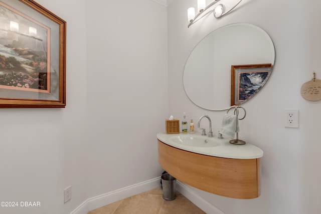 bathroom featuring sink and tile patterned flooring