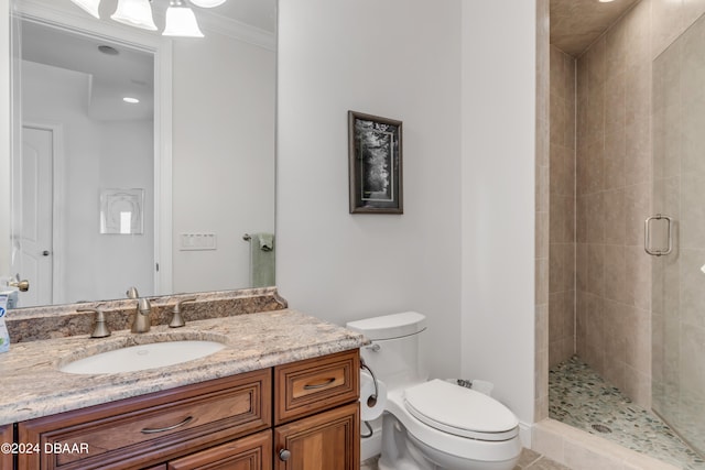 bathroom featuring ornamental molding, vanity, an enclosed shower, tile patterned floors, and toilet