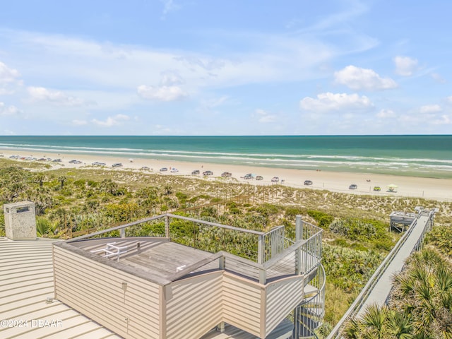 property view of water featuring a beach view