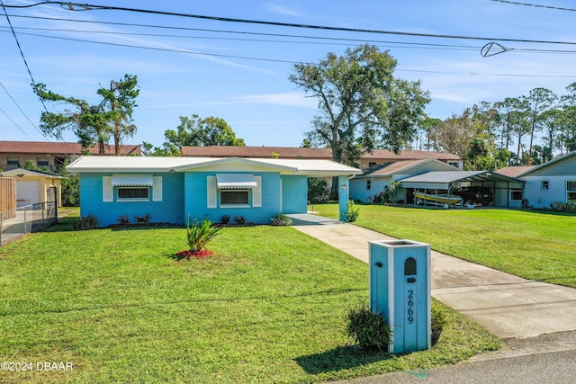 single story home featuring a front yard