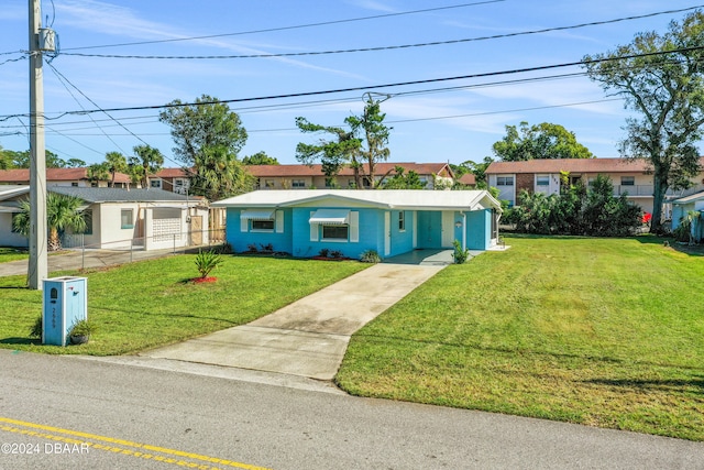 ranch-style home featuring a front yard