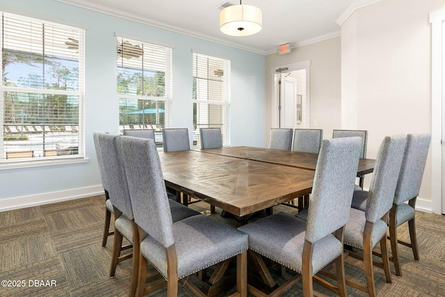 dining area with visible vents, crown molding, and baseboards