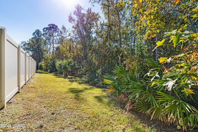 view of yard featuring fence