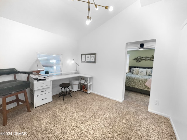 office area featuring high vaulted ceiling, light colored carpet, and ceiling fan