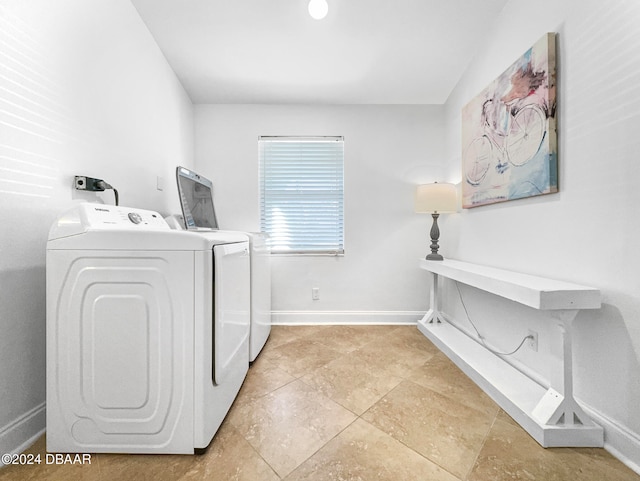 washroom with washer and clothes dryer