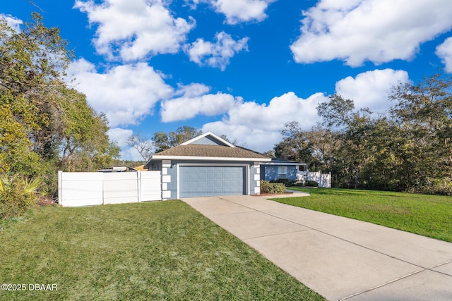 single story home featuring a front yard and a garage