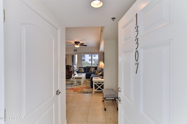 hallway with light tile patterned floors