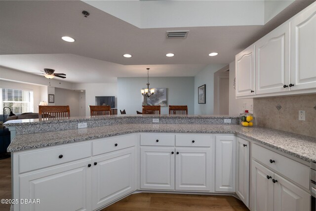 kitchen featuring stainless steel appliances, white cabinetry, and sink