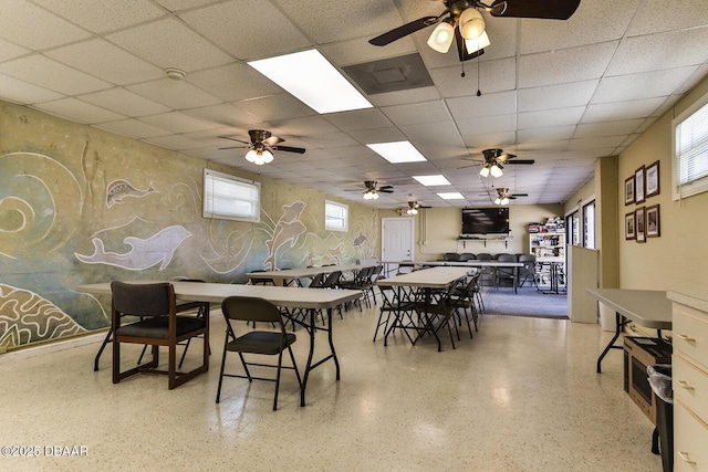 59 Cardinal Dr Unit A, Ormond Beach, FL 32176 - dining area with a paneled ceiling, speckled floor, and ceiling fan