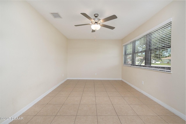59 Cardinal Dr Unit A, Ormond Beach, FL 32176 - spare room featuring ceiling fan and light tile patterned flooring