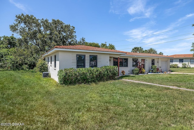 59 Cardinal Dr Unit A, Ormond Beach, FL 32176 - single story home with a garage and a front yard
