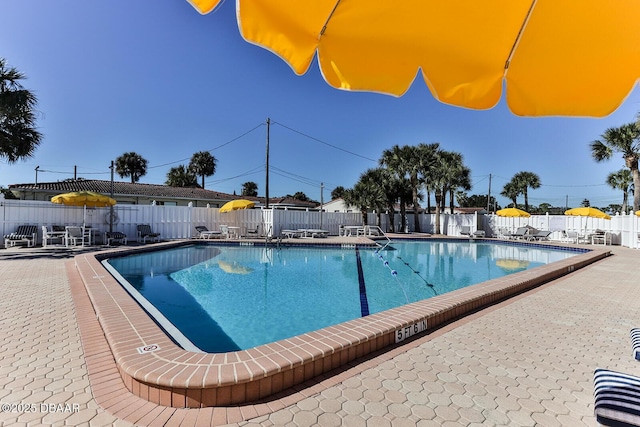 59 Cardinal Dr Unit A, Ormond Beach, FL 32176 - community pool with a patio