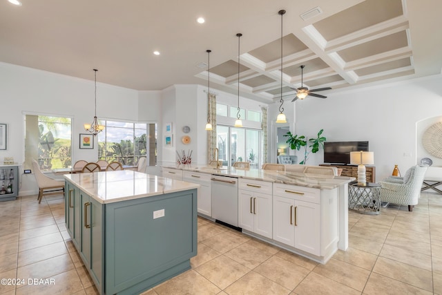 kitchen featuring visible vents, dishwasher, a kitchen island, white cabinetry, and open floor plan
