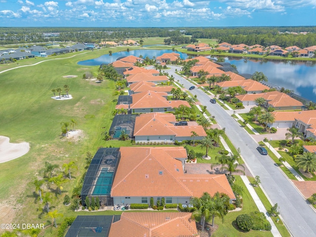 bird's eye view with a residential view and a water view