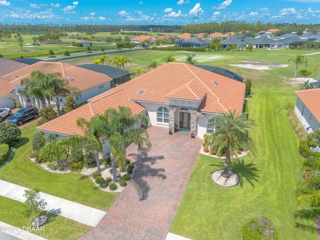 birds eye view of property with a residential view