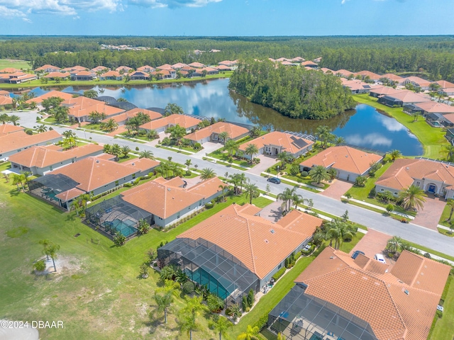 bird's eye view with a water view and a residential view