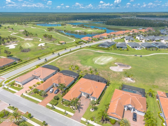 bird's eye view with view of golf course, a residential view, and a water view