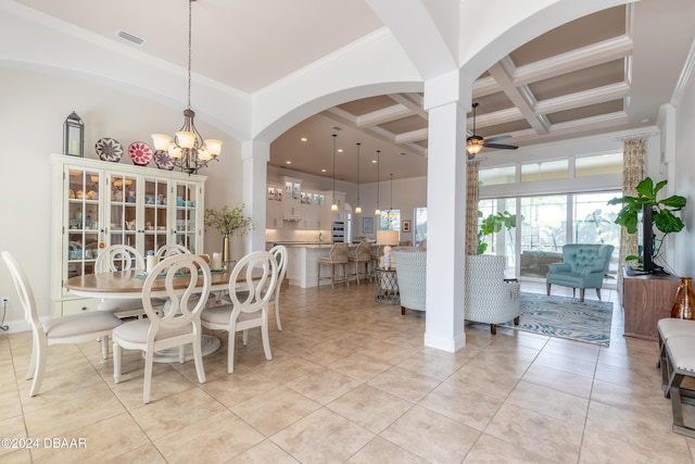 dining space with coffered ceiling, ceiling fan with notable chandelier, a towering ceiling, arched walkways, and beamed ceiling