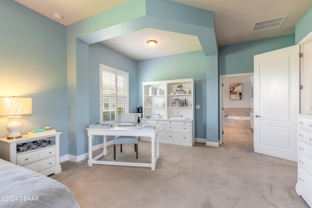bedroom featuring light carpet, baseboards, and visible vents
