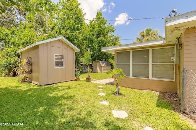 125 Azalea Dr, Daytona Beach, FL 32117 - view of grassy yard with a storage shed