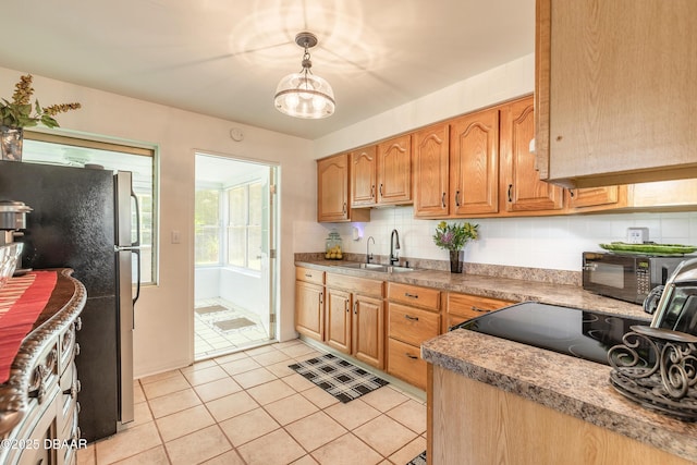 125 Azalea Dr, Daytona Beach, FL 32117 - kitchen featuring freestanding refrigerator, backsplash, light tile patterned floors, pendant lighting, and electric range oven