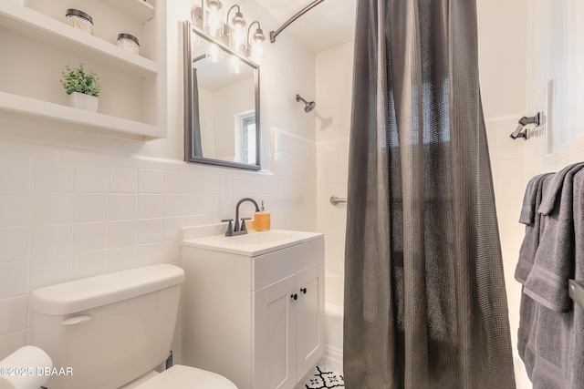125 Azalea Dr, Daytona Beach, FL 32117 - full bathroom with tile walls, vanity, and shower / tub combo with curtain